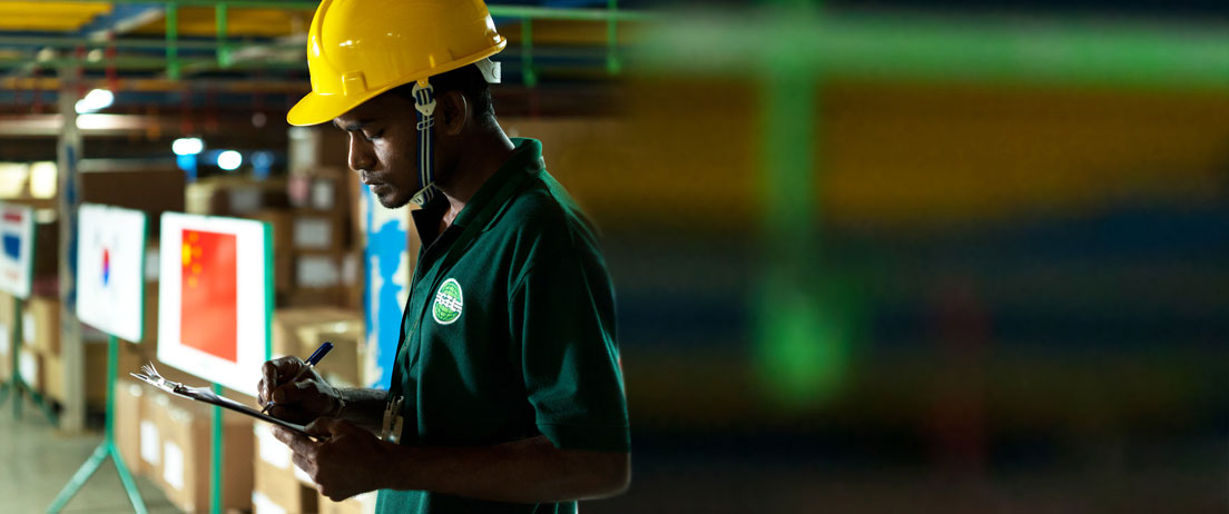 GTL warehouse operator checking a consignment